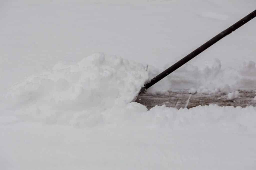 Shoveling snow after a winter storm snow removal shovel